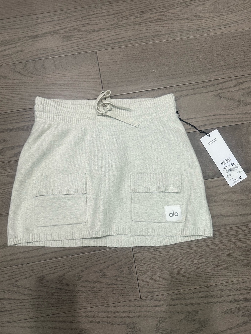 ALO Yoga Cream Knit Mini Skirt with Front Pockets